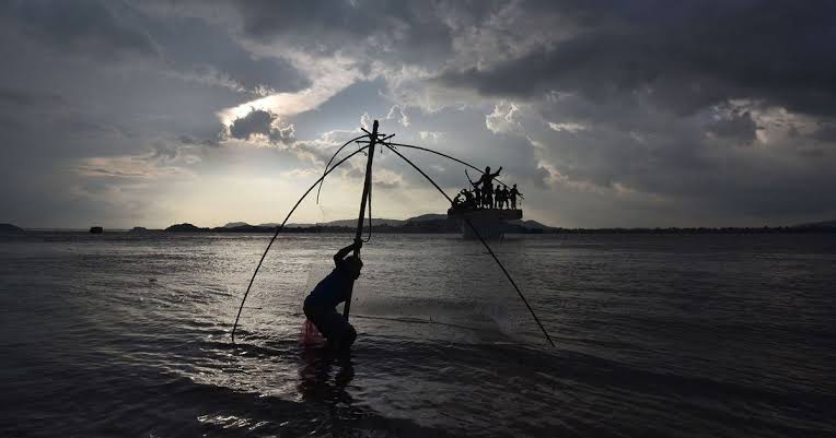 A fisherman in River Brahmaputra